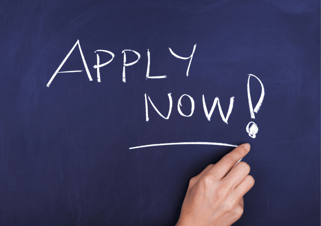 apply now written on a black board graphic